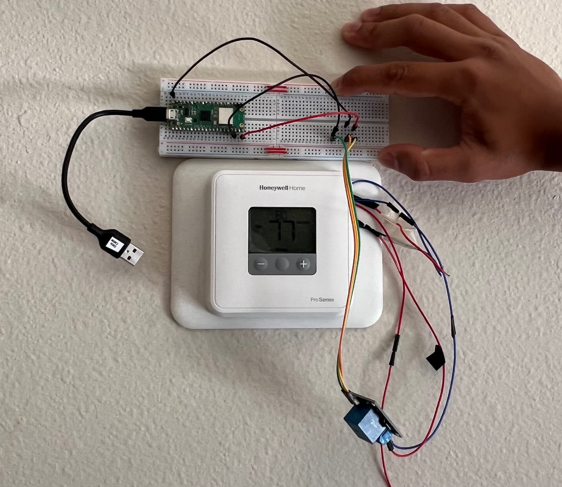 honeywell-home-thermostat-on-the-wall-with-the-raspberry-pi-pico